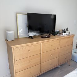 solid wood living spaces dresser with matching night stands. 
