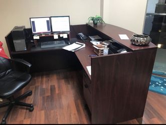 Desks chairs and conference tables