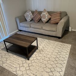 Couch , Rug And Coffee Table 