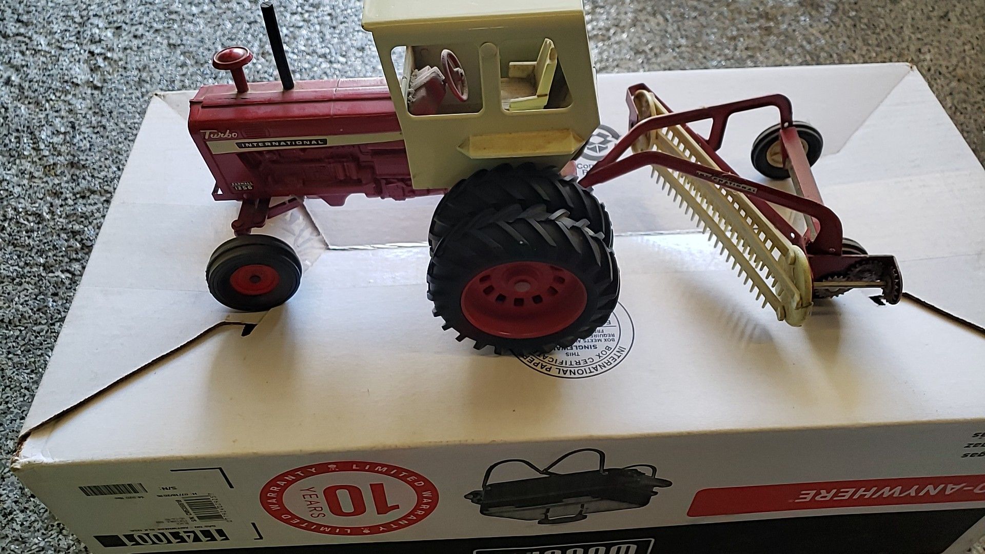 Vintage international harvester tractor and rake