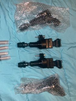 Ignition coils with spark plugs