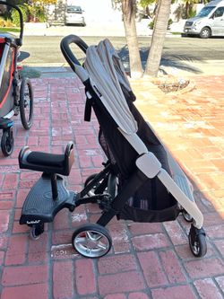 Larktale stroller with seat attachment