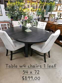 Table w4 chairs 1 leafWe are located at 2811 East Bell road. Another Time Around Furniture.