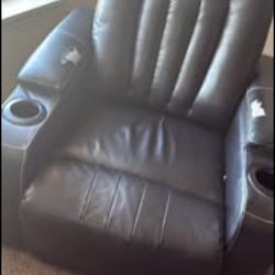 Recliner Asking 110 Has a few Tears lights On the Bottom And Cup Holders 