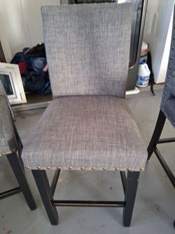 8 dark grey chairs in good condition
