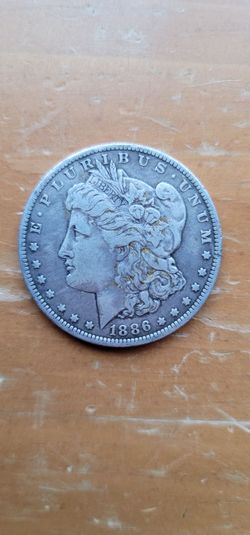 1886 o Morgan silver dollar