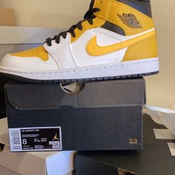 Air Jordan 1 Mid University Gold Men Size 8.        Women Size 9.5.  