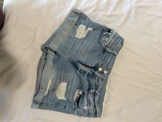 cuffed, distressed KanCan denim shorts generally ranges from $45.00 to $58.00
