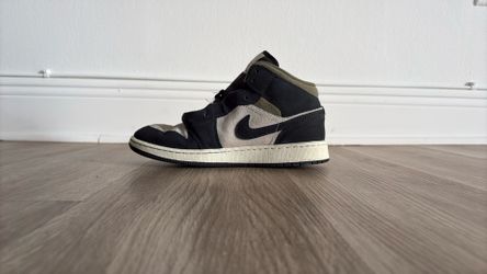 Size 7, Nike Air Jordan 1 Mid SE sneakers in a Light Orewood Brown and Medium Olive colorway