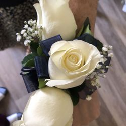 Corsage and boutonnière set for $39
