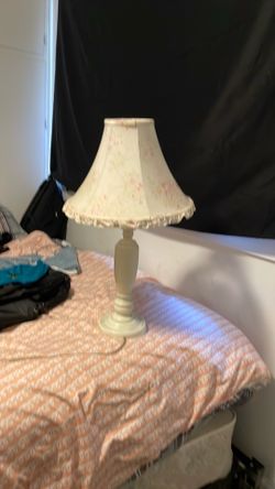 white flower lamp with light bulb and cord