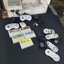 1990 Retro Gaming Console Nintendo Famicom with 2 Games, 2 Controller for $250! Firm. Or all 5 Games. 7 Controllers $360! Firm. Cash & trade welcome