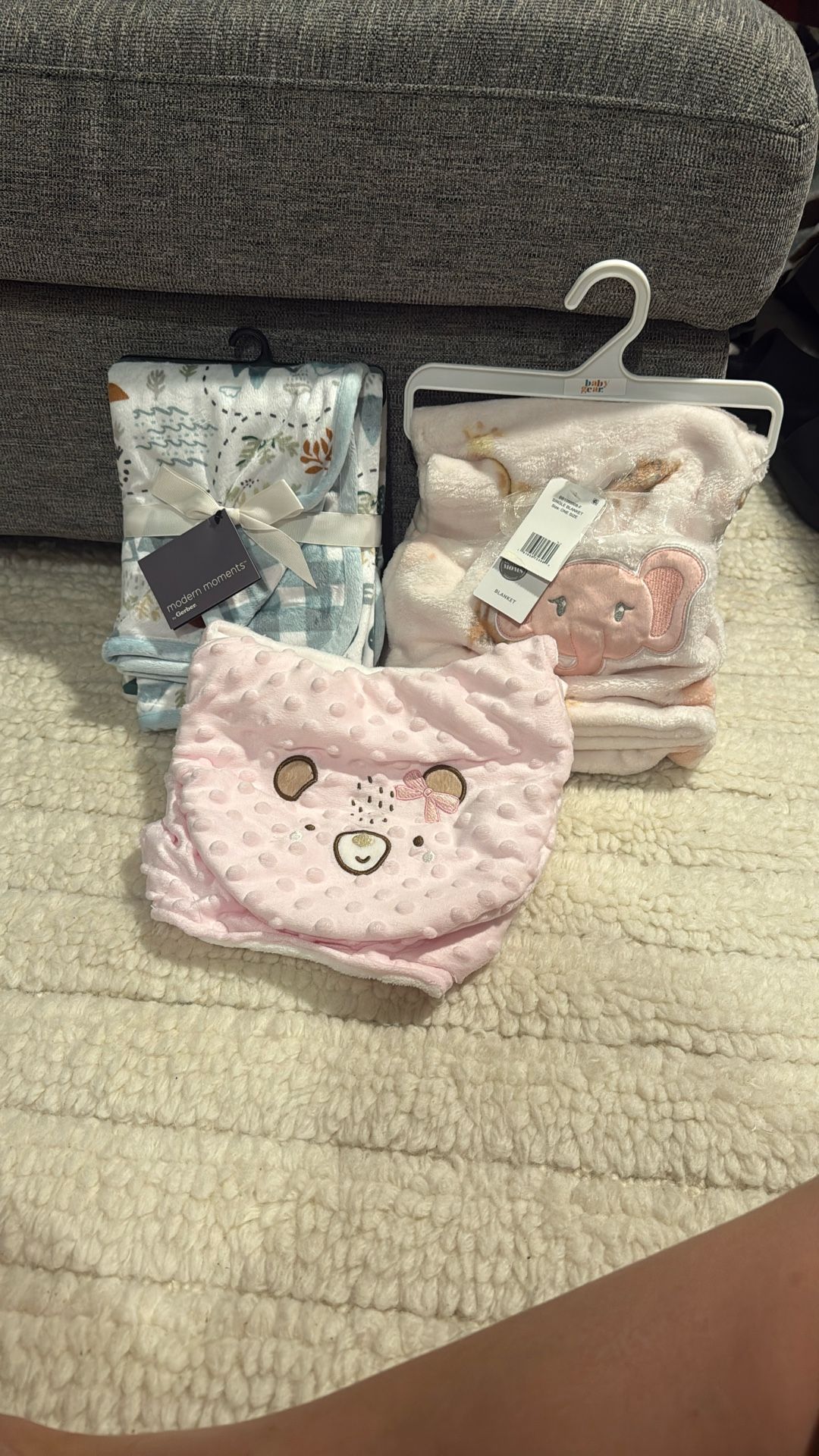 Two Baby Blankets And One Swaddle