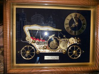 Vintage 1910 Touring Car frame and clock