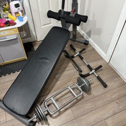 An Bench, Pull Up Bar, Triceps Bar And 40lbs Of Weights 