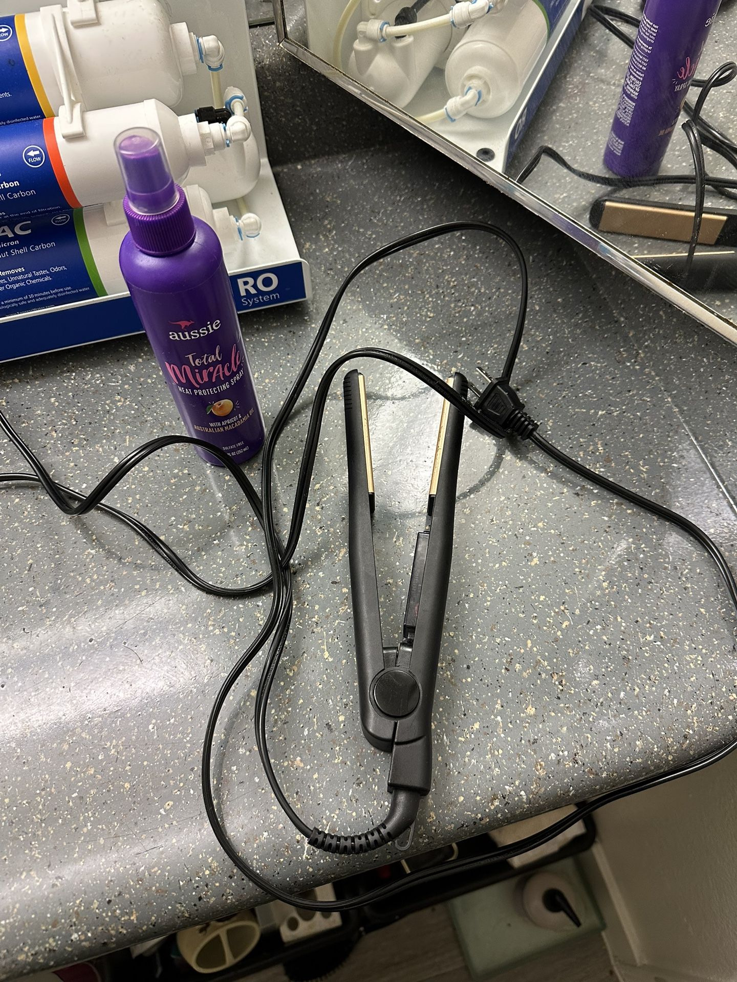 Hair Straightener And Heat Protectant Spray