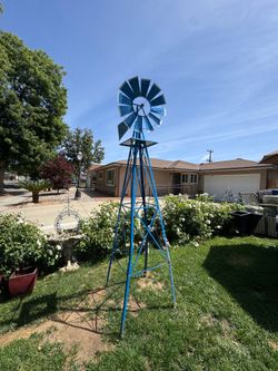 Blue windmill $100 free delivery Blue windmill $100 free delivery