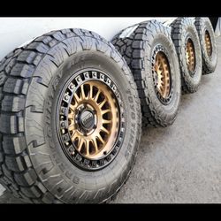 17" KMC rims w- 33" Toyo At3 Tires. $2300 Gold/black Lip