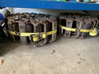 Skid steer tracks for over the tires with the rubber pads