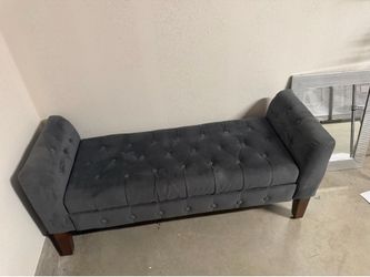 Grey velvet storage ottoman
