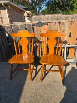 2 solid wood chairs