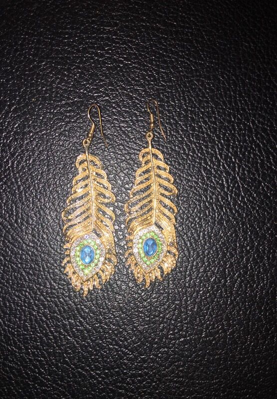 Beautiful gold and gem studded earrings