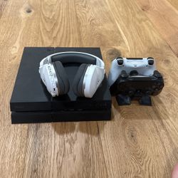 PlayStation 4, with two controllers, and headset