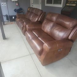 Gouch and love seat.Both electric recliners and working condition someware