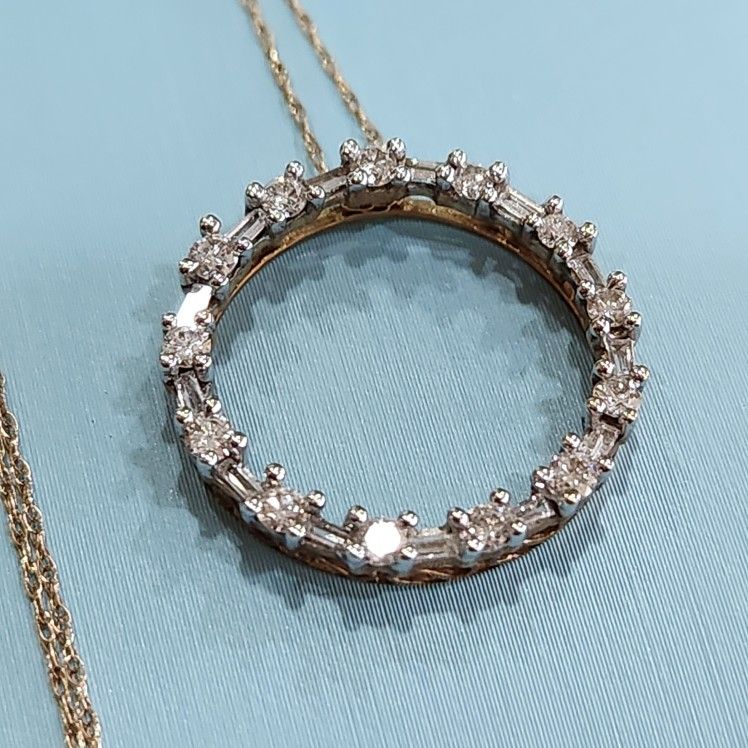 Ladies Diamond Round And Baguette Circle Of Life 14K Yellow Gold Pendant Necklace