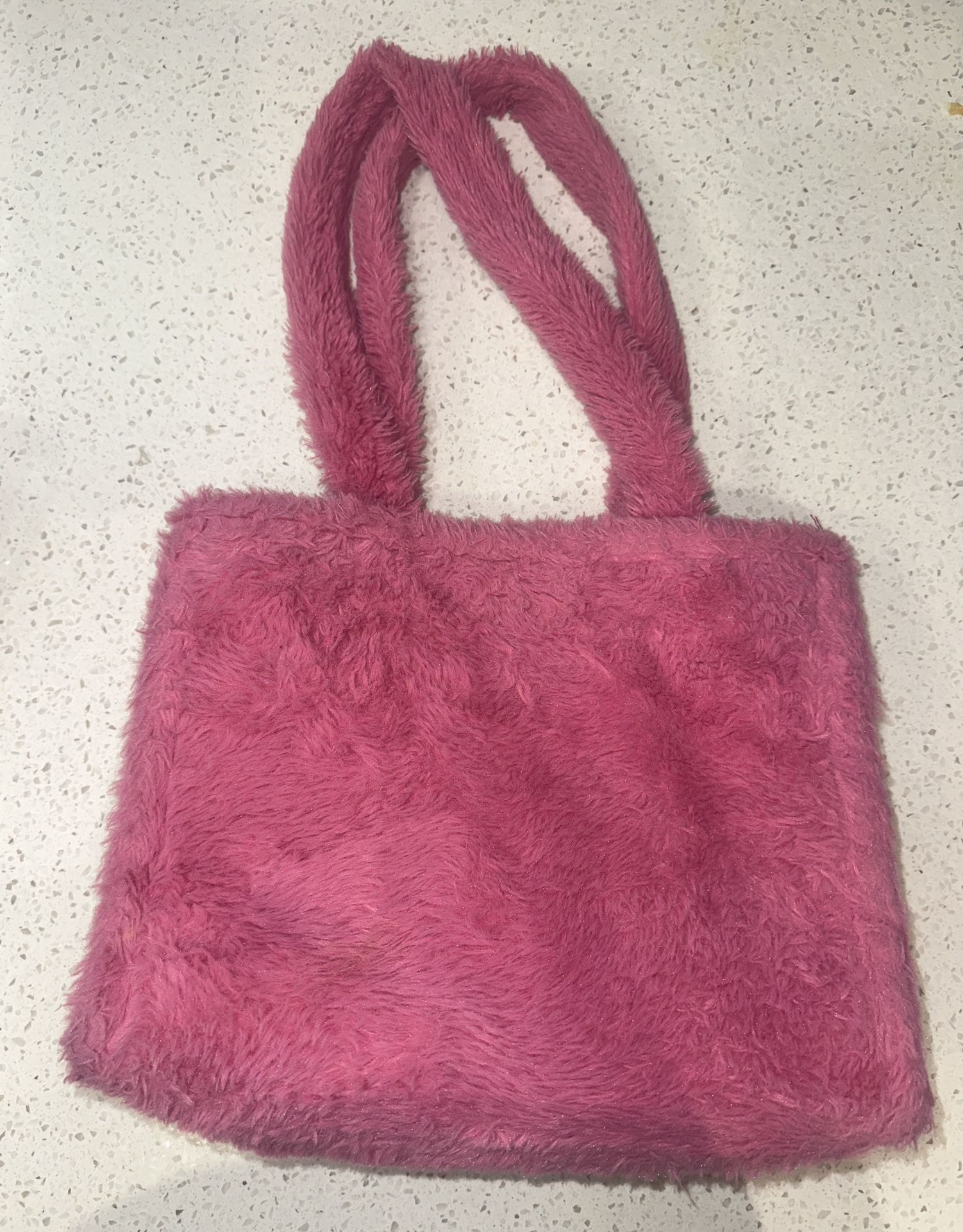 Pink fuzzy bag