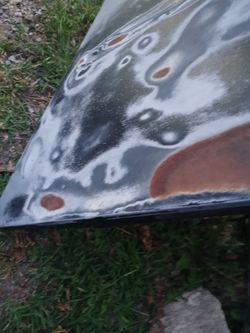 1992 obs hood with a couple of dents