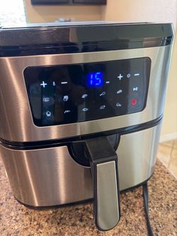 Ruigo branded air fryer with a black and silver finish