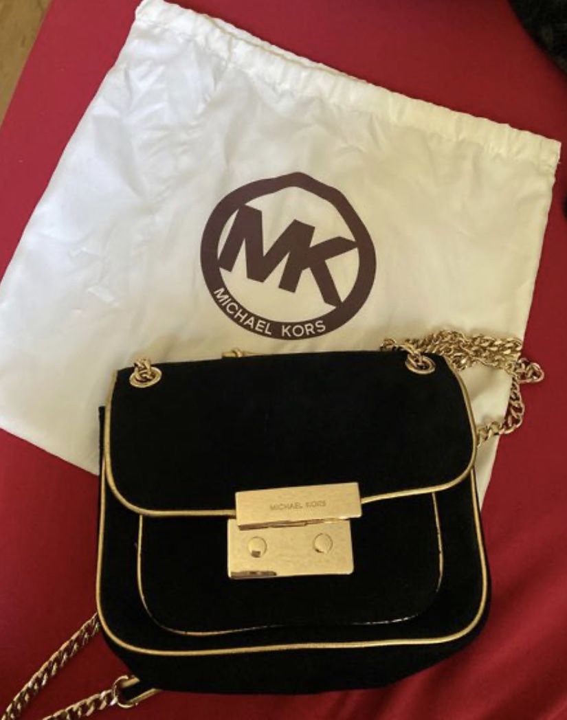 New!!! Authentic MK Black velvet satchel with gold trim and a gold chain strap.