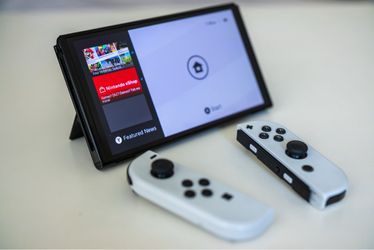 Nintendo Switch OLED Bundle Rare White Edition Premium Model + Super Mario Galaxy 1 & 2 Physical Bundle