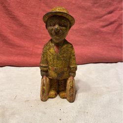  Cast-iron WWll Soldier bank. 