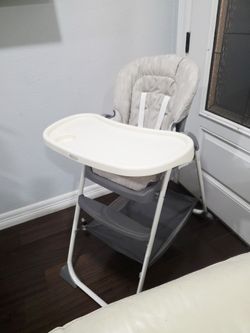 Graco Slim Snacker Highchair, High Chair with One-Hand Fold, Adjustable Recline, Whisk
