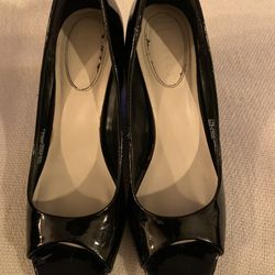 Black heels size 7 wedges by Nickels