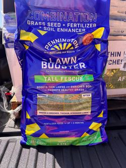 Tall fescue grass seed blended with fertilizer and soil nutrients