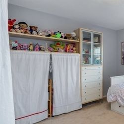Glass fronted cabinets with connecting shelves