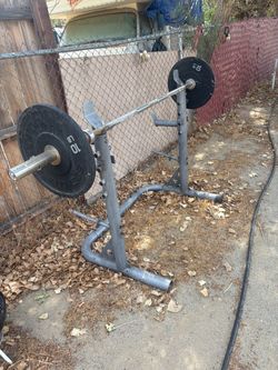 Squat Rack with Barbell and Weight Plates
