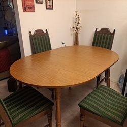 Oval Brown Dining Table With 4 Chairs