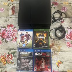 Play Station 4 including 4 games