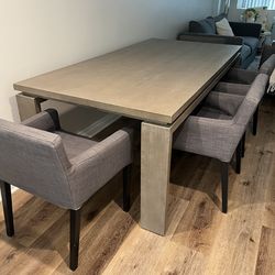 Selling a wooden dining table (1 year old) purchased from Living Spaces along with 4 dining chairs (4 years old) from IKEA. 	•	Table: 1 year old, stur