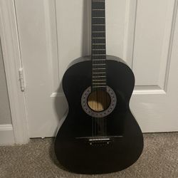 Black acoustic guitar 