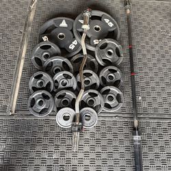 Olympic rubber coated weights 175lbs total plus curl bar and 6ft bar