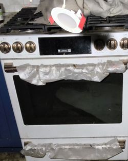 White Gas Range Oven with Brass Knobs stove