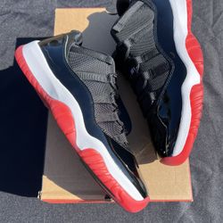 Jordan 11 Retro Low Bred 