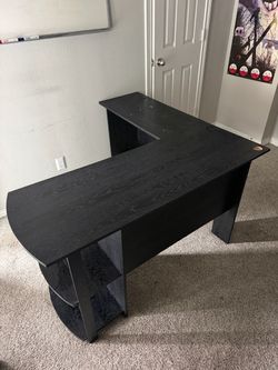 Black L shaped desk