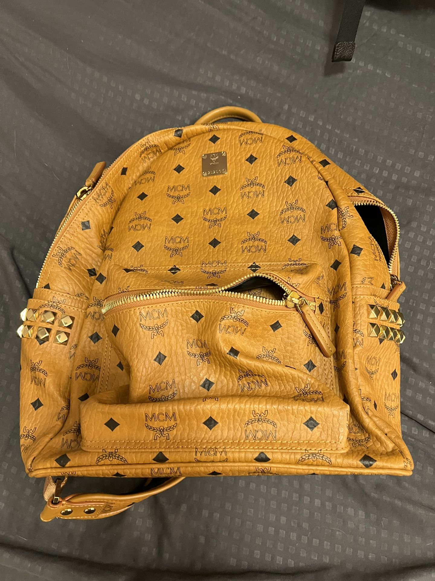 MCM Stark Side Studs Backpack in Visetos Cognac Leather brown - Main Image