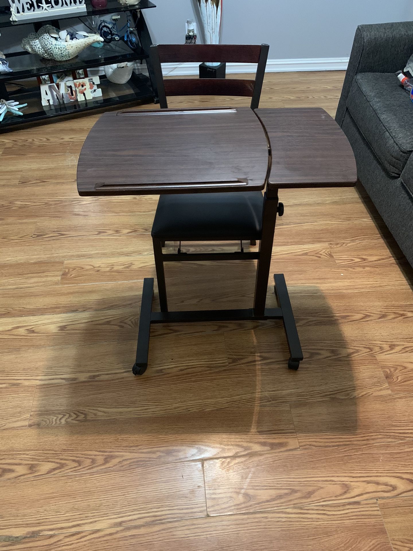 Rolling adjustable desk and foldable chair